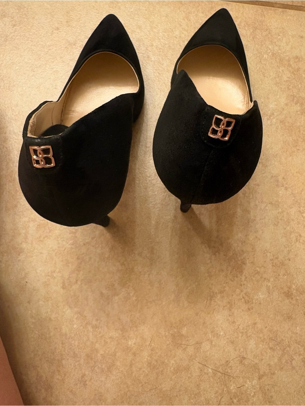 Mavette black suede pumps size 39 featuring a pointed toe gold-toned charm